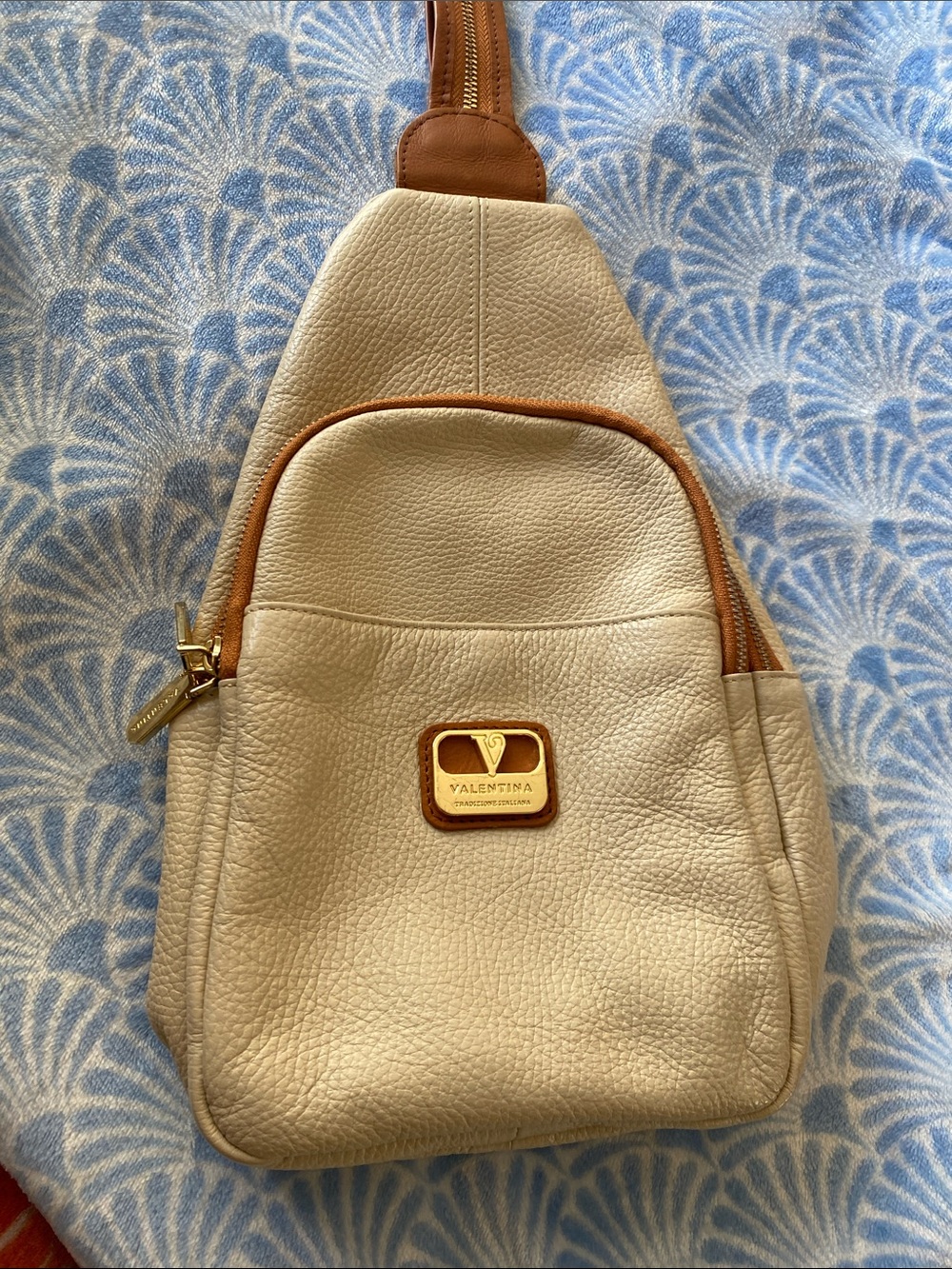 Valentina Cream Crossbody Sling with Tan Trim and Gold Plaque